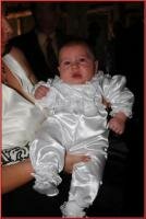 Andrei s-a linistit..e imbracat de gala.....a fost botezat..s-a saturat de plans...