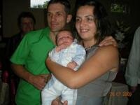eric cu mami si tati la botez